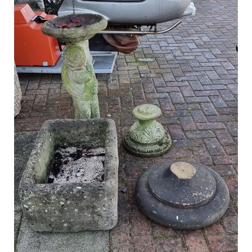 14 - A Butlers sink with concrete cover, 66 x 47cm, a bird bath, 78cm, a York stone urn base and another ... 