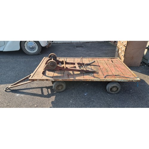 308A - A Lister 1 ton flat bed trailer, type 7PN, together with a sack barrow