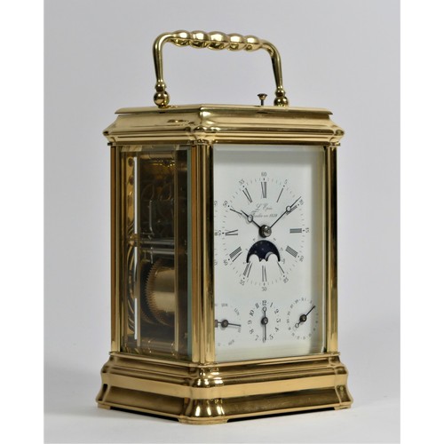 L'Epee Fondee an 1839, c.1980/90, a rare gilt brass limited edition brass gilded carousel type tourbillon Gorge cased carriage clock, the white enamel dial with radial Roman numerals, outer minute divisions, Arabic five-minute numerals, alarm setting, date and days of the week dials below, aperture for the moon phases with lunar calendar, blued steel Breguet hands, the signed movement numbered 79, striking on a gong, the case numbered 79, 14 x 9.5 x 8cm, key.
When this model was first produced L’Epée made the following statement: L’Epée has decided to return to one of the firm’s key areas of expertise that has made the company famous over the years  by designing and developing one of the complications most sought-after by connoisseurs: a “Carrousel” type tourbillon. In  this type of complication, the balance, the spring and the escapement are housed within a carriage of which the rotation  axis coincides with the centre of the escapement and performs one complete turn per minute. This finely tuned carriage  contains a poising weight and its rotation is driven by the barrel via a classic gear train.
Condition report, overall very good condition, good case, good dial, good glass, the working movements keeps time, all features appear to work but not guaranteed. Appears original key.