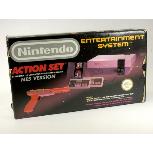 53 - A Nintendo NES Action Set (model No NESE-001, original box, polystyrene insert, AV and power cables ... 