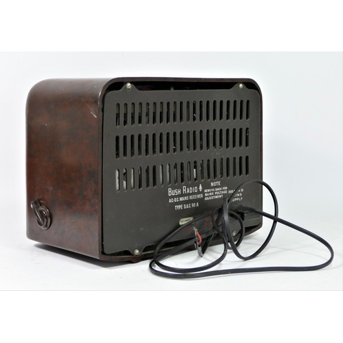 93 - A Bush Type D.A.C. 90 A valve radio (serial No 73/228678), Bakelite case, power lead (no plug), Mull... 