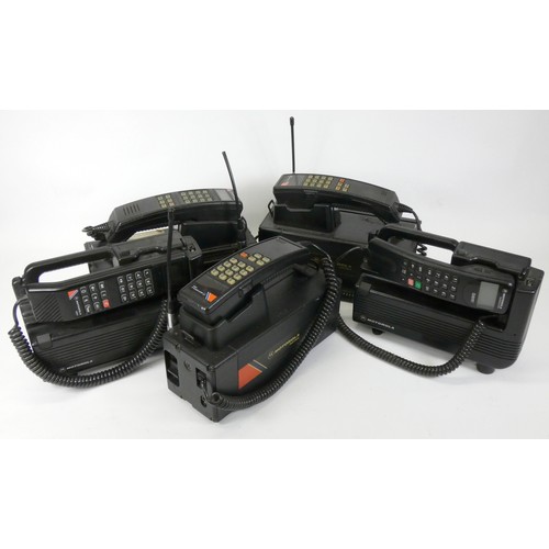 122 - Five Motorola mobile/car phones, to include two 4500x, a 6800x, a International 2200 GSM and a 4800X... 