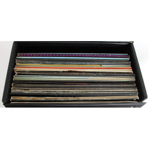152 - A collection of thirty one vinyl LPs, to include David Bowie - Aladdin Sane (1973-RCA), Pink Floyd -... 