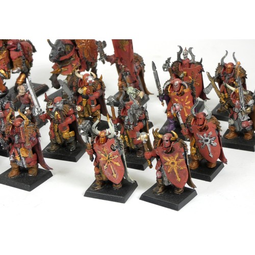 230 - A collection of thirty one Games Workshop miniatures, painted, including cavalry, infantry and zombi... 