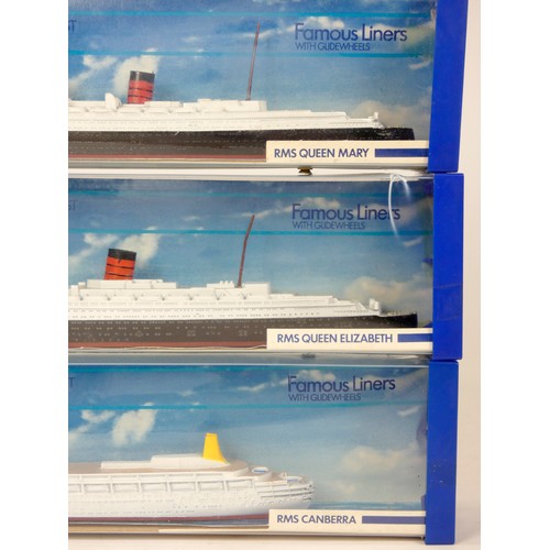 241 - Three Minic Ships by Hornby, 1:12000 scale, RMS Canberra, RMS Queen Elizabeth and RMS Queen Mary, or... 