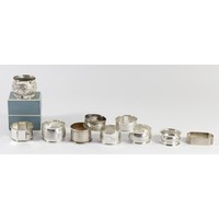 A collection of eight silver napkin rings, various dates, 114 gm, an Indian silver example and a plated example