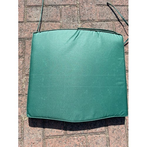 7 - Thirty six garden seat cushions, green, foam, approximately 50cm x 50cm, new old stock, sold as seen