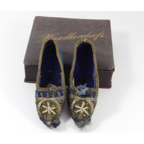 58 - A pair of 19th century child's shoes, blue velvet with wirework and bead decoration, 17.5cm