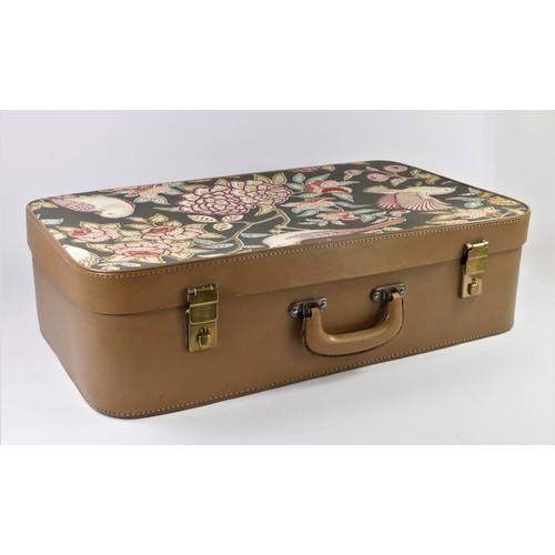 27 - A collection of six mid 20th century suit & vanity cases, one with bird and floral fabric decoration... 