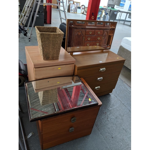 A Dressing Table Two Chest Of Drawers Mirror And A Wicker Basket