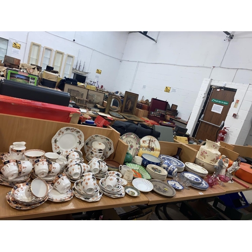 19 - A quantity of household china including part tea sets etc.
