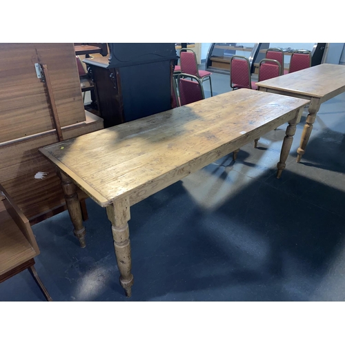 110 - A long pine scrub top table