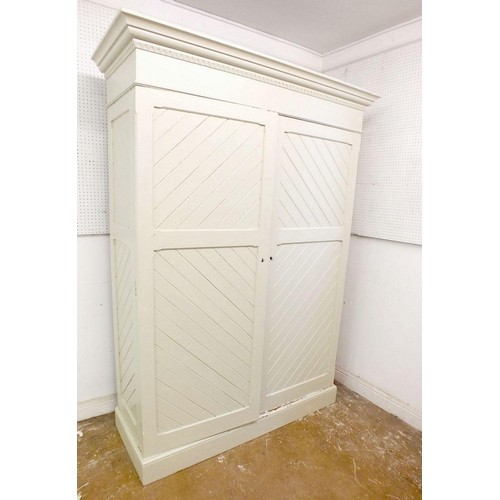 An Edwardian Painted Pitch Pine Wardrobe With Diagonal Panelling And Fitted Interior