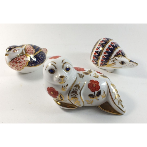 1 - A group of three Royal Crown Derby Imari paperweights in the form of a hedgehog, quail and harbour s... 