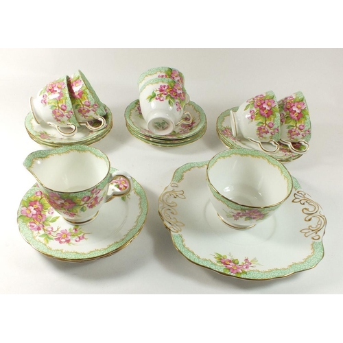 16 - A 1930's Delphine 'Orchard' tea service comprising: six cups and saucers, six tea plates, cake plate... 