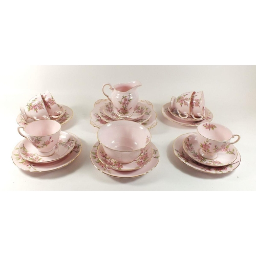 20 - A Tuscan tea service 'Springtime' comprising: six cups and saucers, six tea plates, milk, sugar and ... 