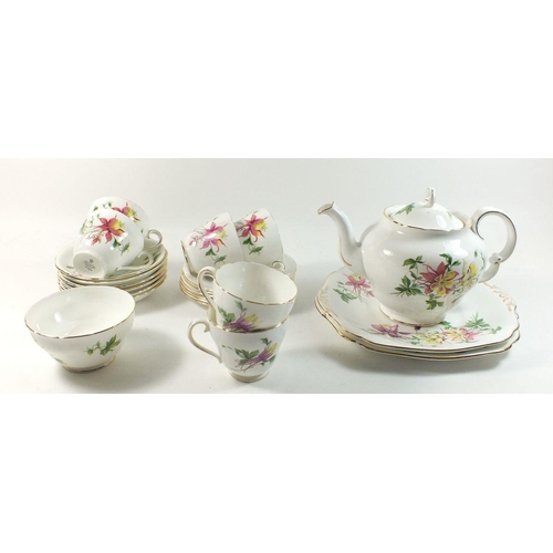 27 - An Adderley teaset printed fuschia comprising: six cups and saucers, teapot, six tea plates, milk an... 