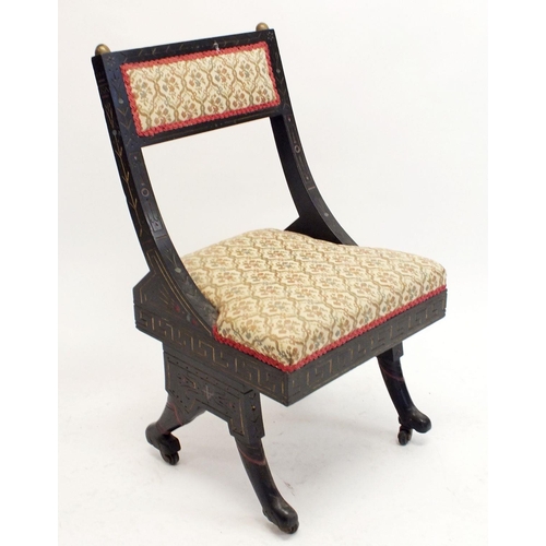 972 - An early 19th century small ebonised chair in the Empire style with incised and painted decoration, ... 