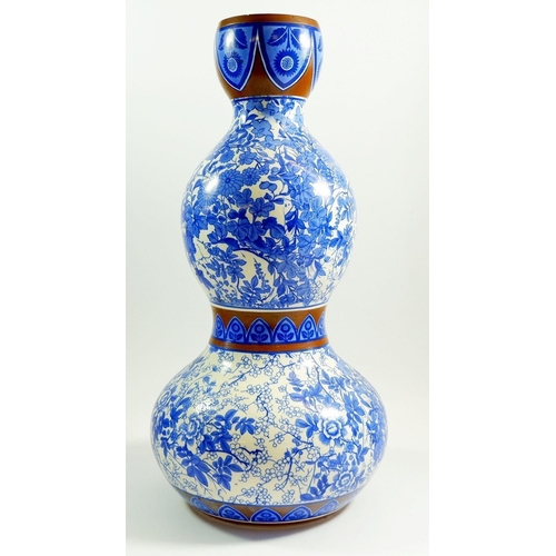 1 - A Victorian Aesthetic Movement blue and white double gourd form vase, 45cm tall
