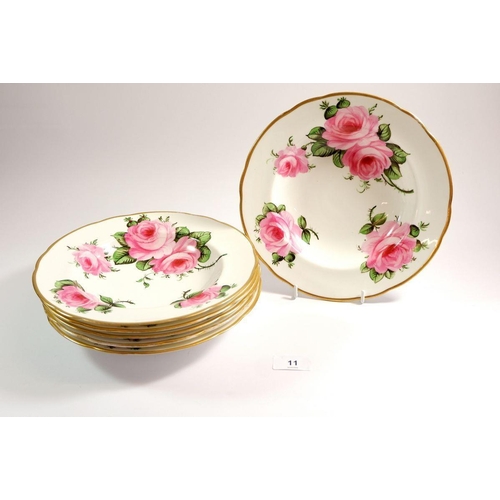 11 - A set of six soup dishes painted roses with T Goode & Co. label