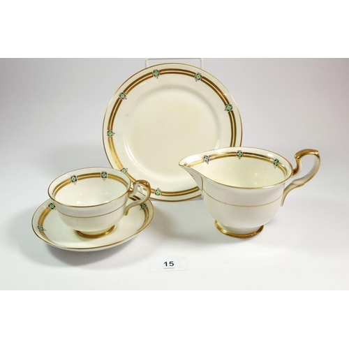 15 - A Paragon gilt and white tea service retailed by Lawleys, including ten cups, eight saucers, eleven ... 