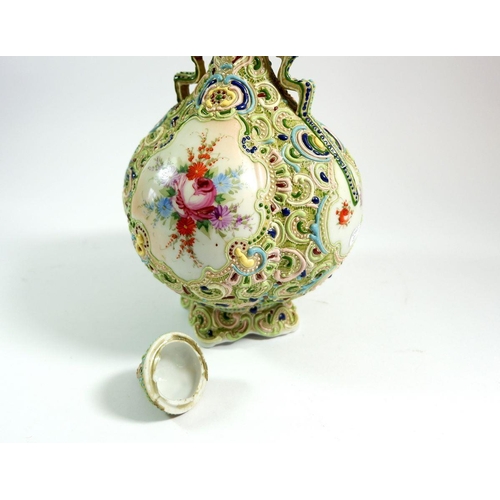21 - A Victorian vase and cover with floral painted decoration, 32 cm tall