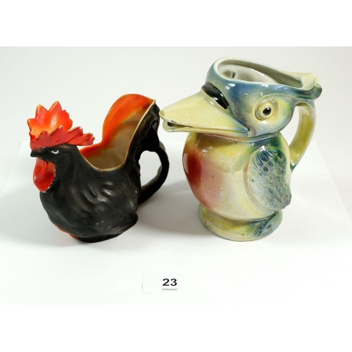 23 - A novelty Art Deco bird form jug and a bisque cockerel one