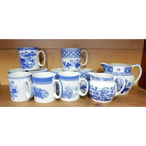36 - Nine Spode 'Blue Room' mugs and two jugs