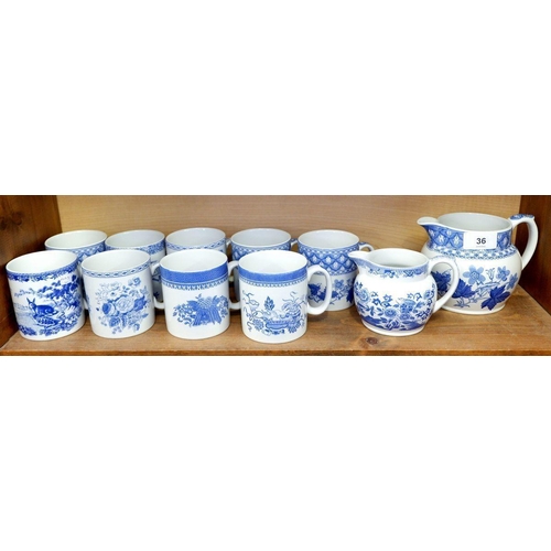 36 - Nine Spode 'Blue Room' mugs and two jugs