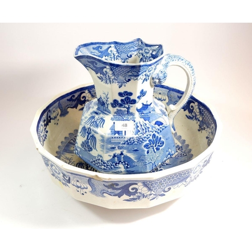 48 - A Mason's Ironstone willow pattern toiletry jug and bowl (bowl a/f)