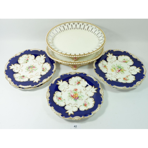 42 - Five Victorian dessert plates painted flowers on a gilt and blue ground and a pair of oval serving d... 