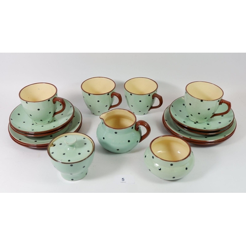 5 - A collection of vintage polka dot Devonshire Pottery tea ware comprising: four cups and saucers, mil... 