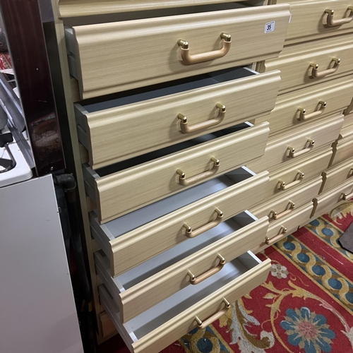 35 - Seven drawer Beech chest of drawers - as new