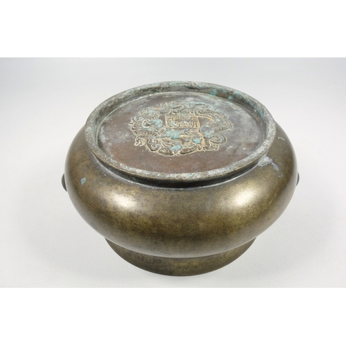 148 - CHINESE BRONZE CENSER OF SQUAT BALUSTER CIRCULAR FORM WITH PLAIN LOOP HANDLES, BEARS SIX CHARACTER X... 