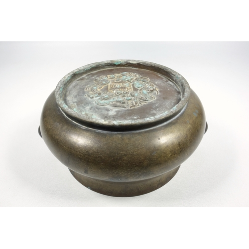 148 - CHINESE BRONZE CENSER OF SQUAT BALUSTER CIRCULAR FORM WITH PLAIN LOOP HANDLES, BEARS SIX CHARACTER X... 