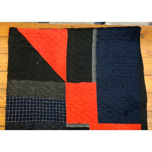 182 - Welsh patchwork quilt 19th C., with bold geometric design, hand stitched wool in black, grey, red an... 