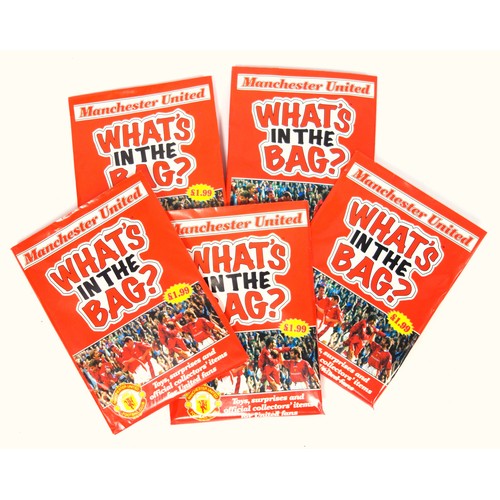 33 - Five rare unopened Manchester United Football Club 'WHAT'S IN THE BAG?' Toys, surprises and official... 