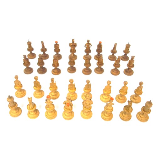 39 - Swiss light and dark carved wood chess set, mostly in the form of figures, of 32 pieces, height of k... 
