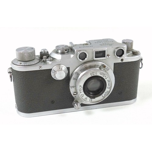 59 - An Ernest Leitz Wetzlar Leica IIIb camera stamped Luftwaffen–Eigentum, serial No362916, with Leitz f... 