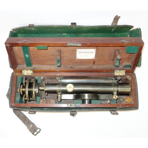 82 - Troughton & Simms brass theodolite in a mahogany case, W 51.8cm and leather carrying case (a lot)