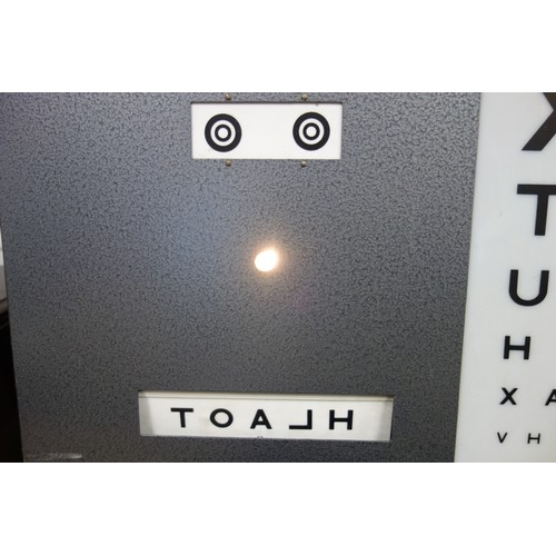 87 - A Vintage electrical Hamblin Opticians ‘Eye Test Chart’ machine, metal cased with alphabetical apert... 