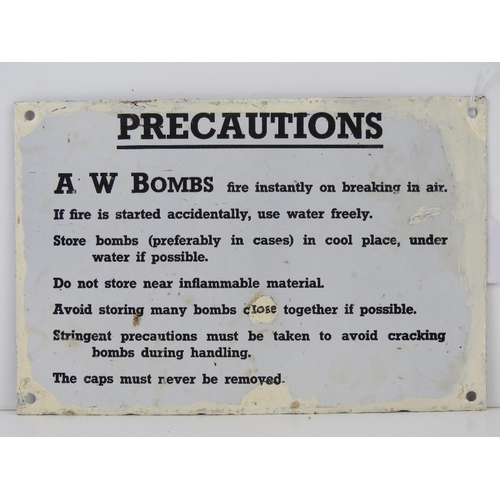An enamelled tin plate WWII warning sign 'AW bombs fire inst... | Barnebys