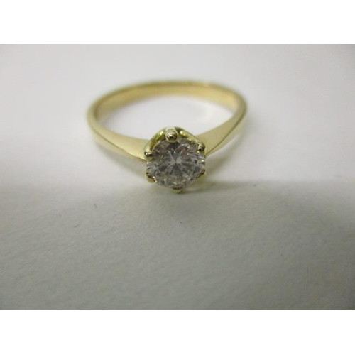 17 - A 14ct gold ring set with a diamond, approx .5ct