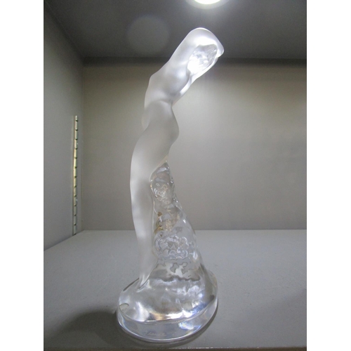 16 - A contemporary Lalique clear and frosted glass model of a Dancer with arms up (Danseuse Bras Leves),... 