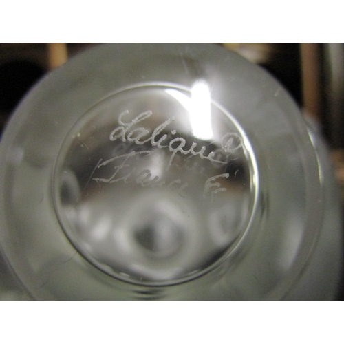2 - A Lalique Falcon Nuages frosted glass scent bottle, the round bottle moulded with cloud motifs, the ... 