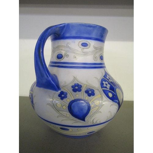 34 - A William Moorcroft design for Moorcroft Pottery, a twin handled vase decorated in a Persian style f... 
