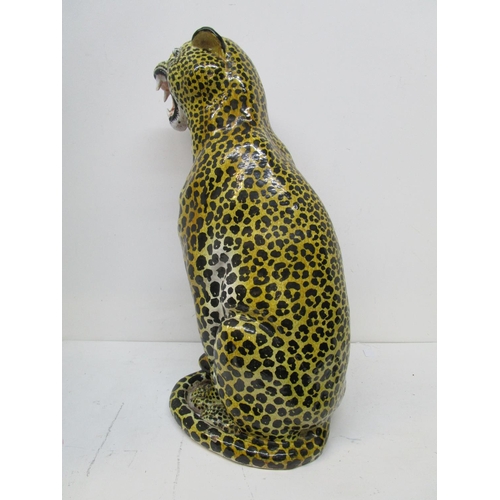 47 - A large Italian floor standing terracotta model of a seated cheetah, stamped marks to base, circa 19... 
