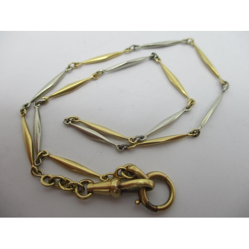 65 - An early 20th century white and yellow metal pocket watch chain, total weight 9.5g