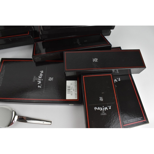 45 - A collection of boxed Art Deco style WMF for Maxim's de Paris cutlery, designed by Pierre Cardin, co... 