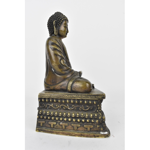 111A - A Sino-Tibetan lacquered bronze or brass statue of Buddha in Dhyana Mudra on a casted base with Vijr... 